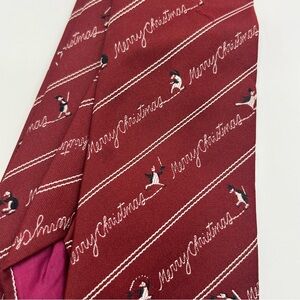 Vintage 1980’s Avon Christmas Tie with Skating Penguins.